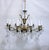 This is a Spanish style bronze chandelier with ornate designed frame and dressed with Swedish style hand cut crystal. It...