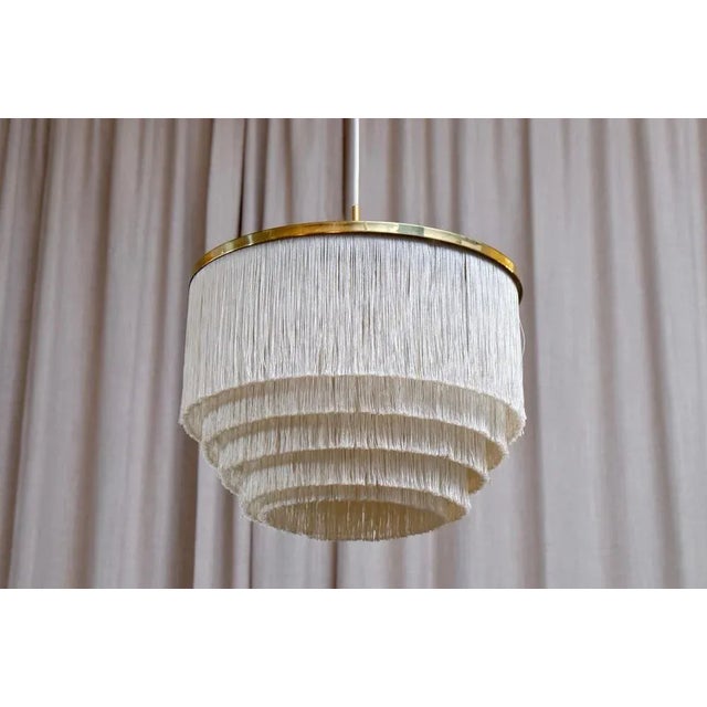 2 pendants available. Hans-Agne Jakobsson ivory/white fringe pendants, 1960s. Produced in Sweden by Hans-Agne Jakobsson AB...
