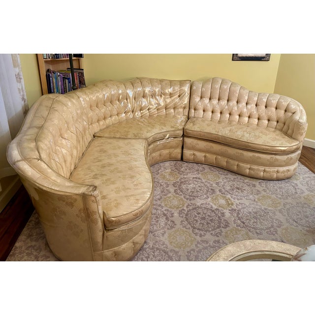 What a stunning three piece, curvy sectional—with the original vinyl protectors still on it! You can almost envision Fran...