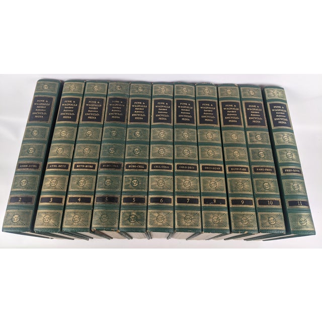 A handsome collection of 11 vintage Funk & Wagnalls Standard Reference Encyclopedia volumes, published in 1959, featuring...
