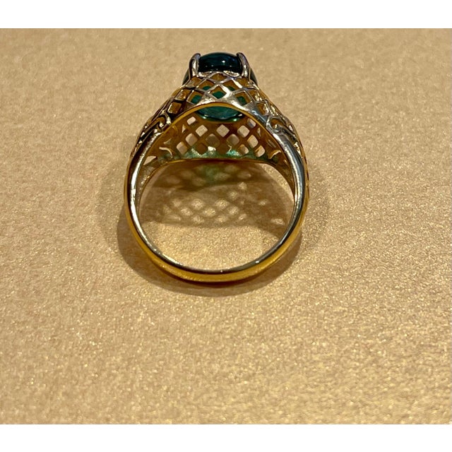 A classic, Cocktail ring Emerald cabochon approximately 3.3 Carat Emerald , Estate with no color enhancement. Color is...