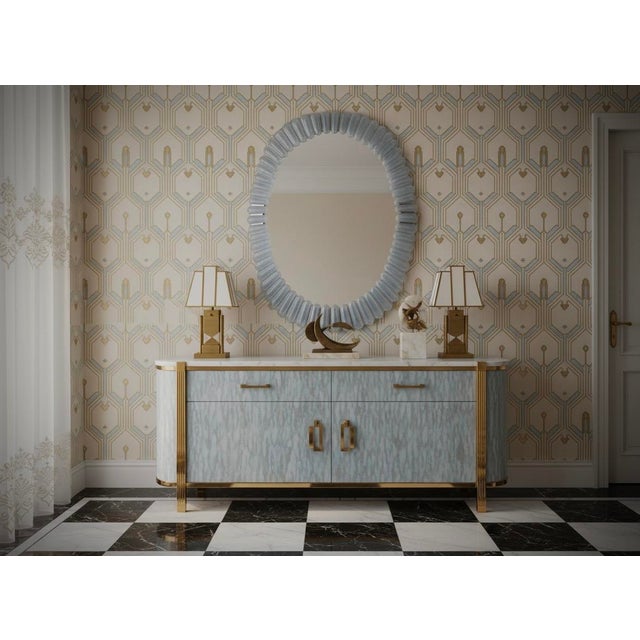 A stunning Murano glass mirror in a sparkling ice white color, Venice. A mirror that will adorn your home on its own. The...