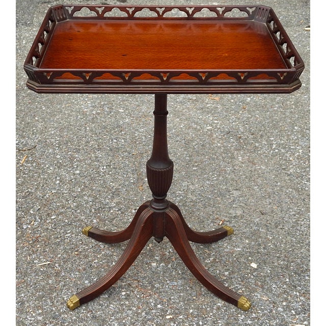 Early 20th Century Federal Style Mahogany Quadpod Pedestal Pierced Gallery Tray Table with Brass Paw Feet. Measures 22.25"...