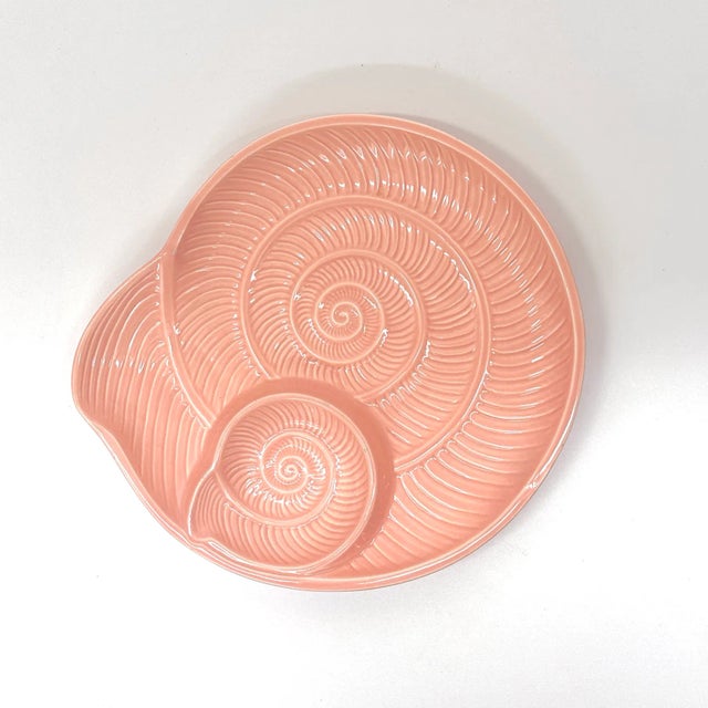 Mixed blush pink decorative plates, group of 9. This beautiful set of decorative plates comes in a variety of designs and...