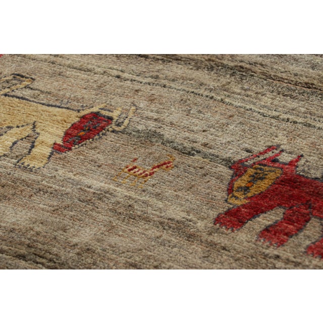 This vintage 4x5 Persian Gabbeh rug is the latest grand entry to Rug & Kilim’s curation of rare tribal pieces. Hand-...