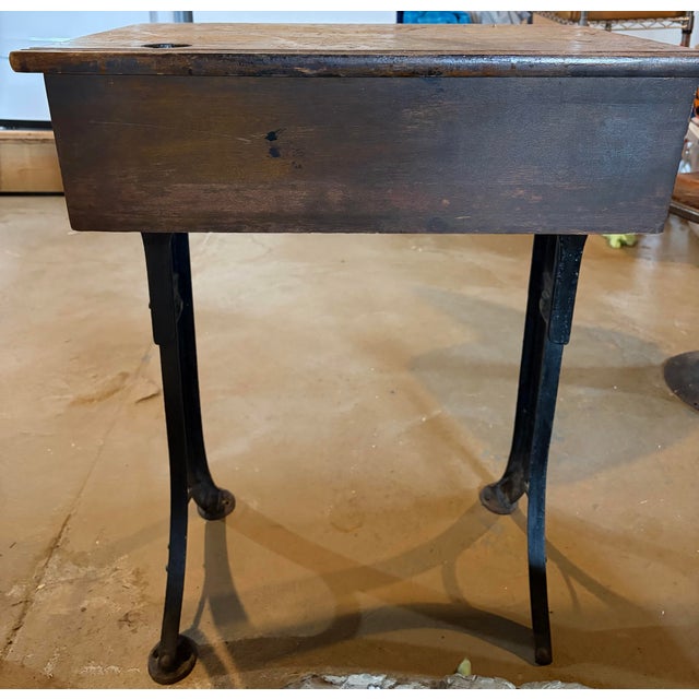 Early 20th century antique cast iron child’s school desk.
