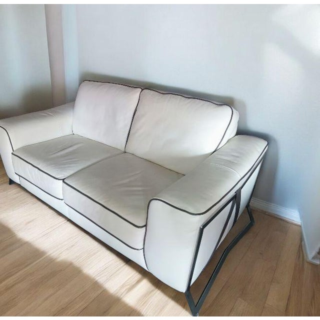 Discover the Violino Leather Sofa, where modern design meets exceptional comfort. This exquisite piece, crafted by a...