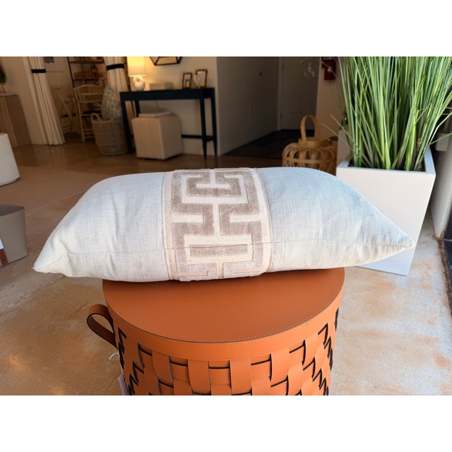 Elevate your space with this contemporary transitional accent pillow, featuring a soft blue linen blend woven fabric...
