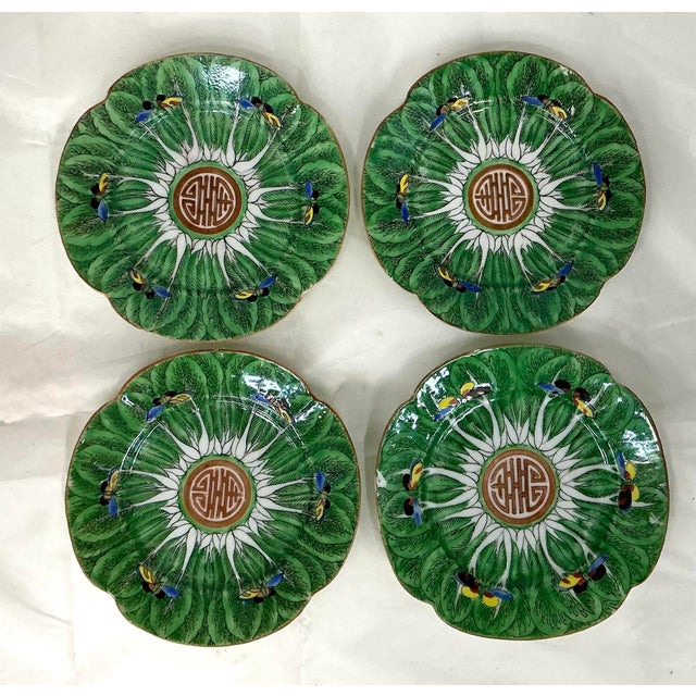 Beautiful set of antique hand decorated dessert plates . Brilliant colors, very little wear. Late19th-early 20th century.