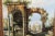 Oil landscape on canvas displayer on giltwood frame This is a stunning almost surrealist painting of an antient arch ruin...