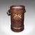This is a vintage decorative stick stand. An English, leather basket or storage bin, dating to the early 20th century,...