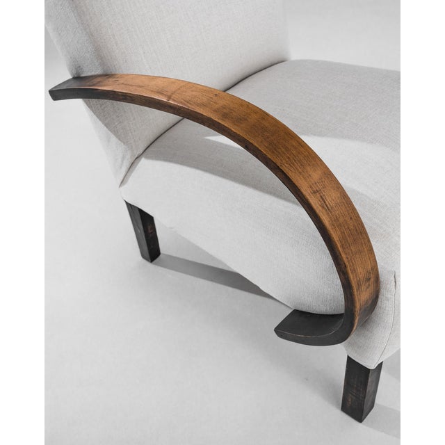 This 1950s Czech Wooden Armchair by Jindřich Halabala is a stunning example of mid-century modern design, blending...