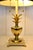 1970s brass pineapple lamp, in the style of Virginia Metalcrafters. The piece includes a black tole shade with gold piping...