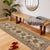 Enhance the ambiance of your home with this magnificent Persian-influenced Turkish hand-knotted rug made by skilled...
