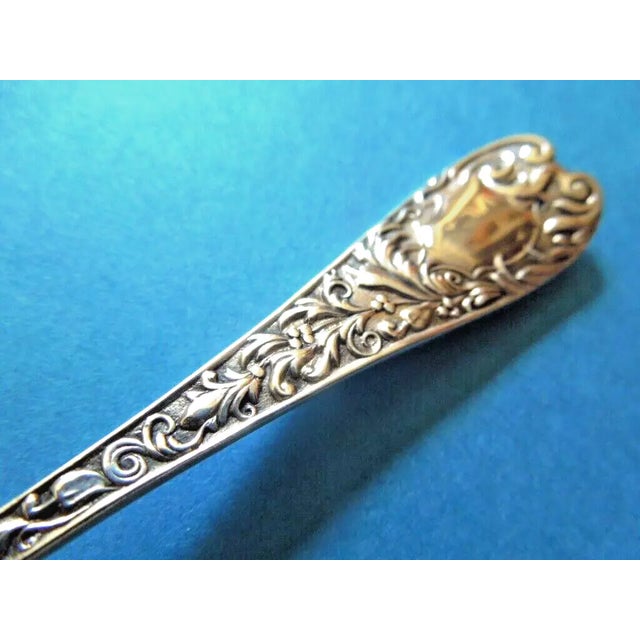 Offered is a pretty ca 1900 sterling silver chocolate spoon in an unknown pattern (possibly No. 5) by Whiting. The spoon...