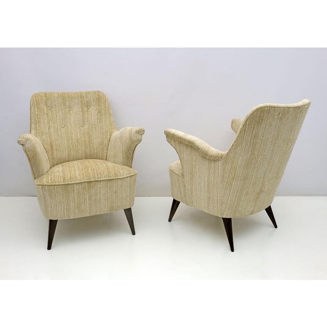 A pair of armchairs designed by Nino Zoncada and produced by Cassina in the 1950s. The armchairs have recently been...
