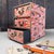 This charming Japanese cabinet with three drawers is made of wood and fully covered in vibrant decorative paper with a...