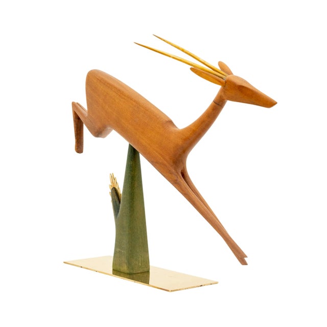 Leaping antelope, Franz Hagenauer, Werkstätte Hagenauer Vienna, c. 1955, carved wood, brass, marked with "wHw" in a...