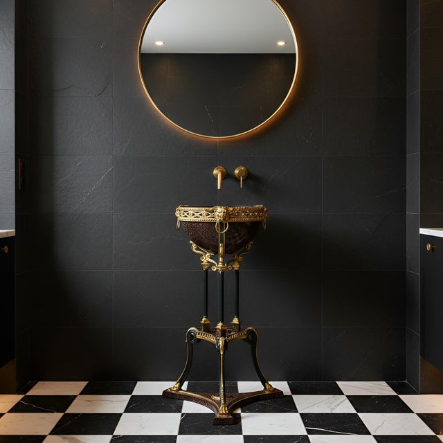 REGENCY STYLE GILT AND FAUX-PORPHYRY IRON ATHENIENNE JARDINIERRE Early 20th century, likely designed to be used as a...