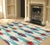 Dress up your floor with fashionable Sari Silk Collections. These beautiful rugs cleverly integrate sari silk dresses,...
