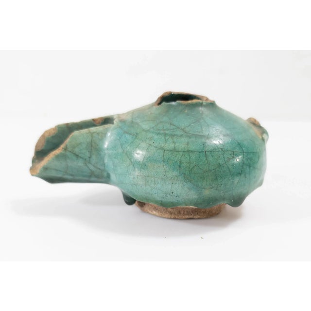 We are selling this Middle eastern style pottery oil lamp with green glaze. Not sure of the exact origin. Condition: Very...