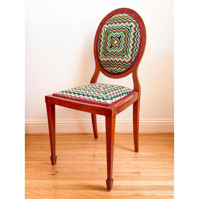 Absolutely stunning one-of-a-kind Sheraton style oval back chair with square tapering legs, which terminate on spade feet....