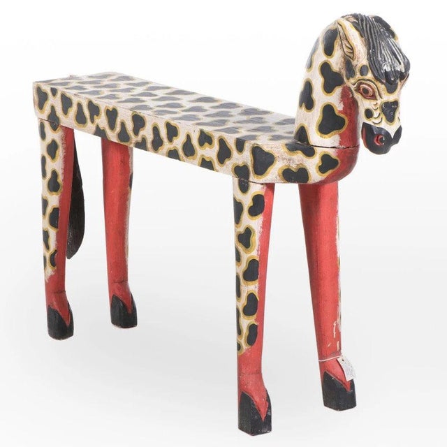 This primitive, folk art style wooden horse would be a cheerful side table for drinks and books. A touch of whimsy for...