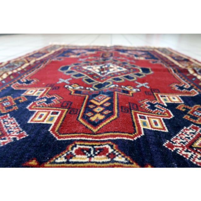 Vintage 1950s European Persian-Style Shiraz Wool Rug 3.2' x 4.6' This vintage Persian-style Shiraz rug, made in Europe...