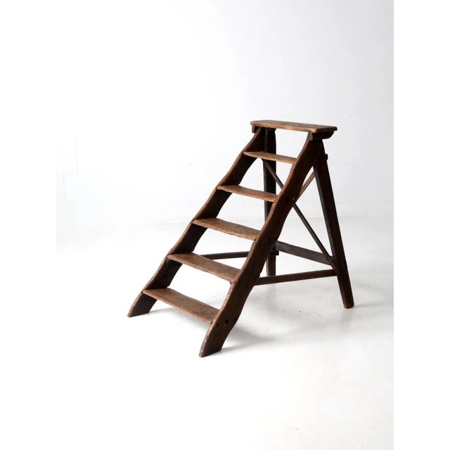 This is a 19th century antique library steps. The decorative stairs make a beautiful shelving display with its warm...