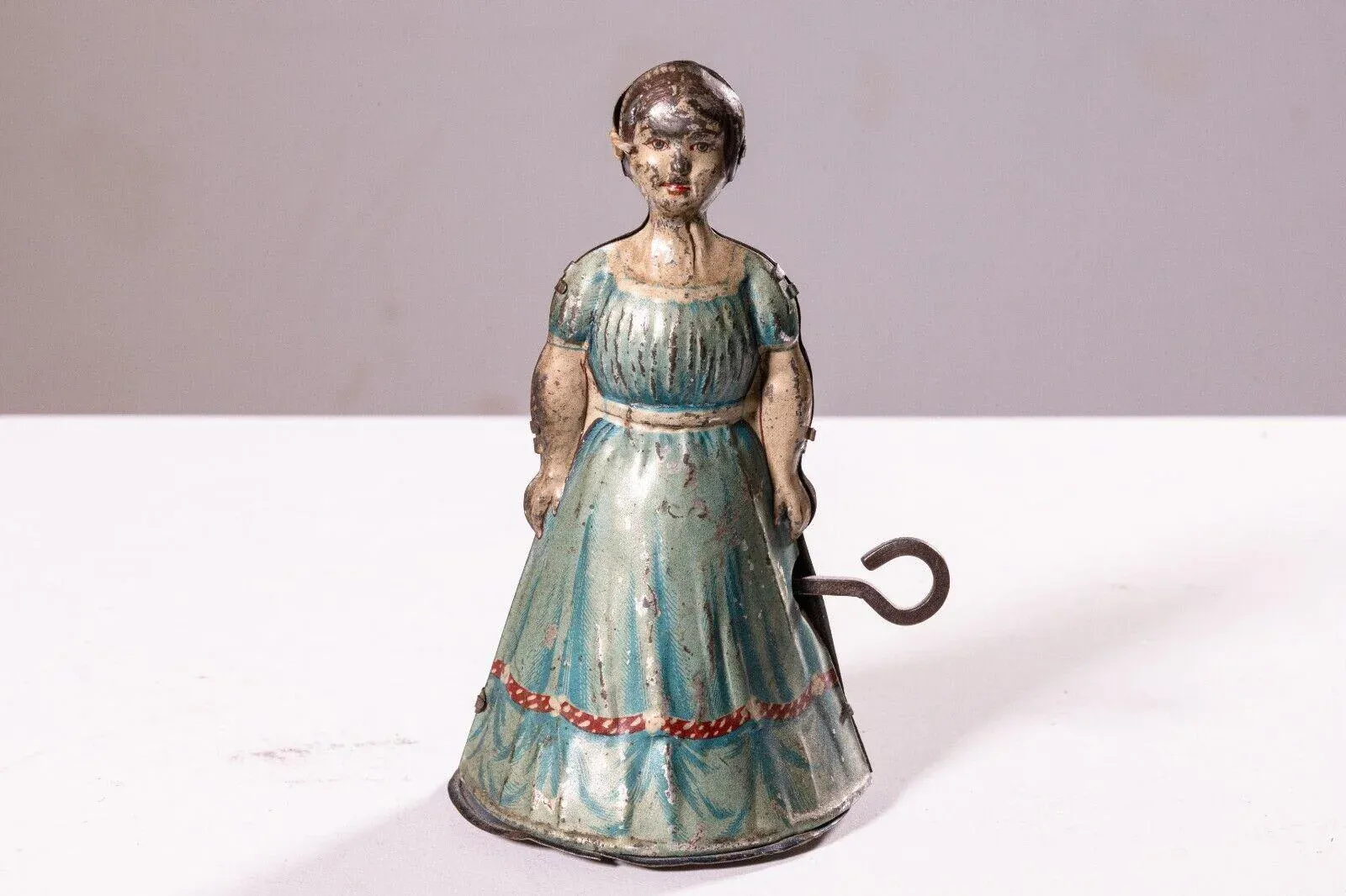 Heinrich Fisher & Co Woman in Apron Antique Windup Tin Toy
