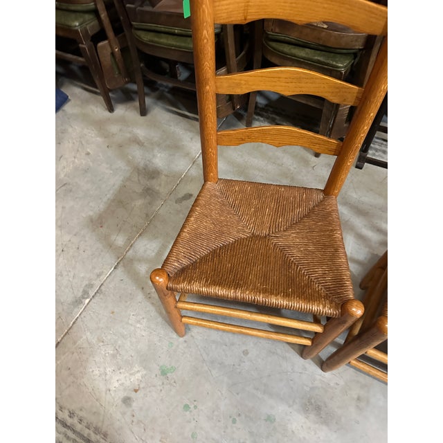 Up for consideration is a beautiful vintage collection of farmhouse style wooden ladder back chairs. These would look...