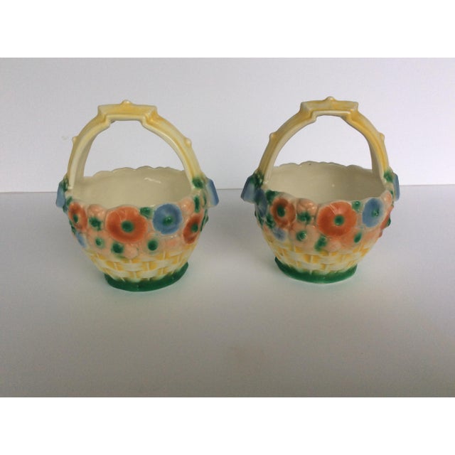 Rare twin set of Czechoslovakian pottery flower baskets hand-painted with flowers in notable Czech orange with blue, pink...