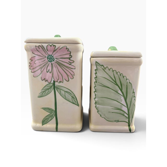 Charming vintage 1999 Art Home International ceramic canister set designed by Trish Richman, featuring a beautifully...