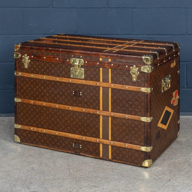 An exquisite louis vuitton trunk dating from the early 20th century. This example represents the tallest of the standard...