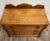 This is a beautiful antique Victorian dresser or chest with three large dovetailed drawers, round wooden pulls, and a...