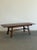 W75 - W95 D35 H30.5 KC25.75 The “1940’s Trestle Dining Table with Leaf Extensions” is a vintage dining table with distinct...