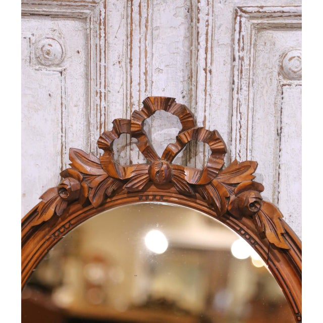 French Pair of 19th Century French Louis XVI Oval Walnut Mirrors With Ribbon Crest For Sale - Image 3 of 9