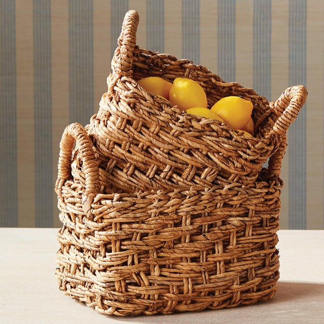 With a unique weave and square profile, this set of 2 baskets with handles are firm and substantial. Made of durable...