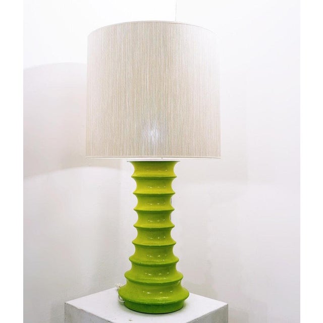 Mid-Century Modern green table lamp, ceramic, 1970s. Up to 250V (Europe/UK Standard).The wiring of this item may be...