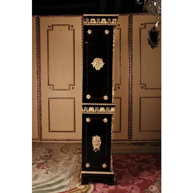 Imposing French bibliotheque library bookcase in Louis XIV style Solid beechwood, ebonized. Highly rectangular corpus...