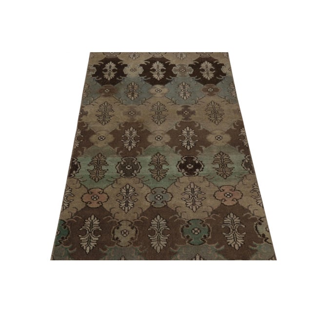 This vintage runner rug is a 3x8 Turkish distressed piece, made with hand-knotted wool circa mid-20th century. It is an...