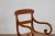 Asian Antique Javanese Wooden Armchair with Carved Back, Curving Arms and Rattan Seat For Sale - Image 3 of 13