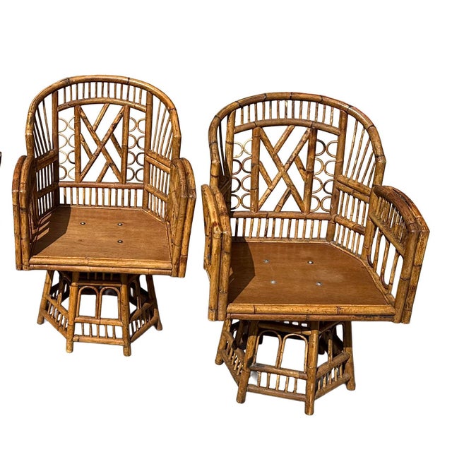 Set of 2 vintage Brighton Pavilion-style rattan and bamboo chairs. Crafted in the mid‑20th century, this set of chairs are...
