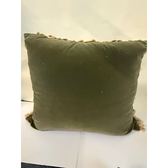 A charming pillow crafted from an antique French Aubusson tapestry, finished with a soft sage-green velvet back and full...