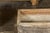 A pair of faux-bois trough shaped planters from the Midcentury period, made of concrete and accented with grey and orange...