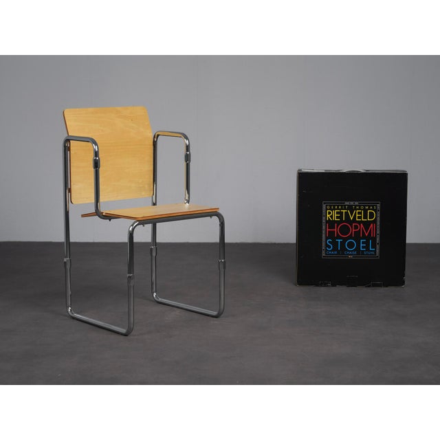 A collectible hopmi chair designed by gerrit thomas rietveld in 1932 and produced in the netherlands in 2013 by architect...