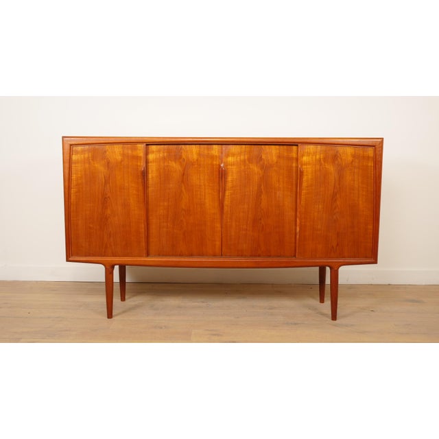 Designed by Axel Christensen for Aco Møbler, this stunning vintage wall cabinet is a wonderful example of authentic Danish...