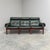 Remarks: Mid century lounge sofa by Eric Merthen for Ire Möbel AB, Sweden 1960s. Oak frame with green leather uphostery....