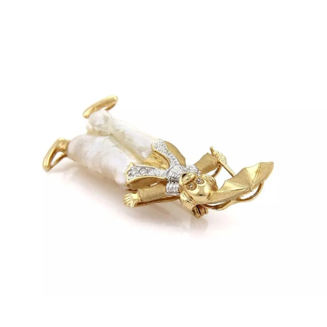 This is a eye catching and impressive clown brooch, it is crafted from solid 14k yellow gold with white gold accent and...