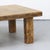 This large, square coffee table from the 1960s is crafted in the Brutalist style and made of solid oak. The wood shows...